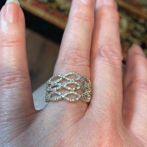 This is 925 sterling silver ring of all clear stones are not diamonds.